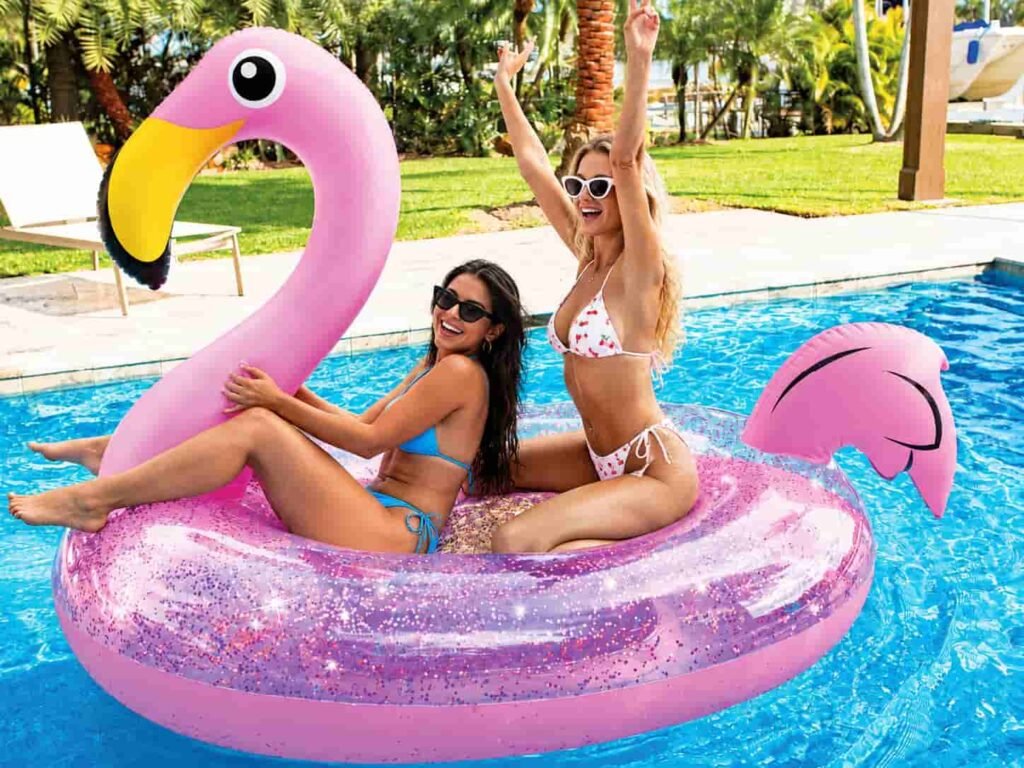 Flamingo shaped inflatable pool ride-on