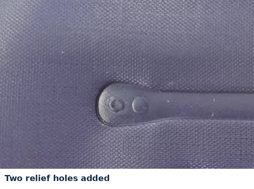 Relief holes added to inflatable I-beam welding area