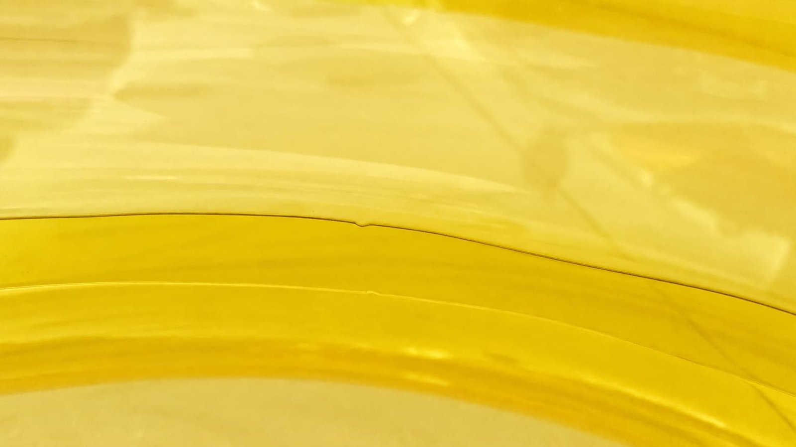 Hot-air welded overlap seam on a commercial water park slide tube